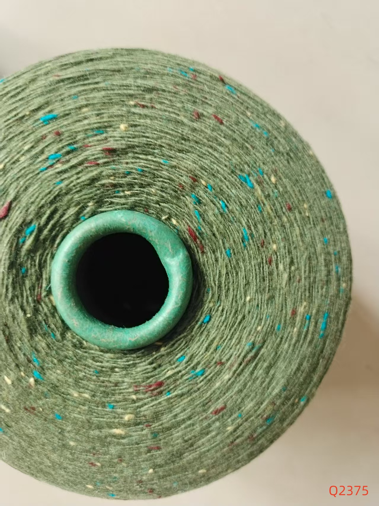 7.6支含40%羊毛軍綠色Q2375彩點(diǎn)紗